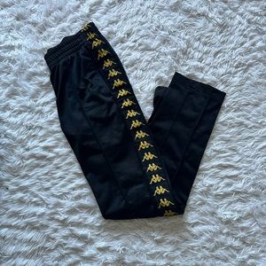 Black and yellow Kappa tracksuit bottoms size small adult unisex